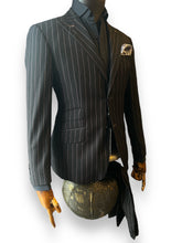 Black suit with pink stripes