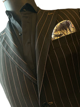 Black suit with pink stripes